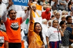 howdy modi photos, howdy modi event in houston, in pictures narendra modi indian americans at howdy modi, Indian flag