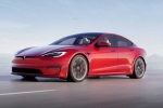 Tesla new electric car pictures, Tesla new electric car leaked, tesla to launch electric hatchback without a steering wheel, Hatchback Tesla new electric car pictures, Tesla new electric car leaked, tesla to launch electric hatchback without a steering wheel, Hatchback