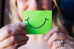 fake smile, faking a smile at workplace, faking a smile at work makes you drink more after hours suggests study, Positive emotions fake smile, faking a smile at workplace, faking a smile at work makes you drink more after hours suggests study, Positive emotions